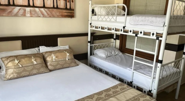 Кровать в общем номере Telmessos Neva Hotel - Halal-Non Alcoholic  Hotel
