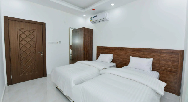 Familie over to etager suite Summit Hotel Suites القمة للأجنحة الفندقيه
