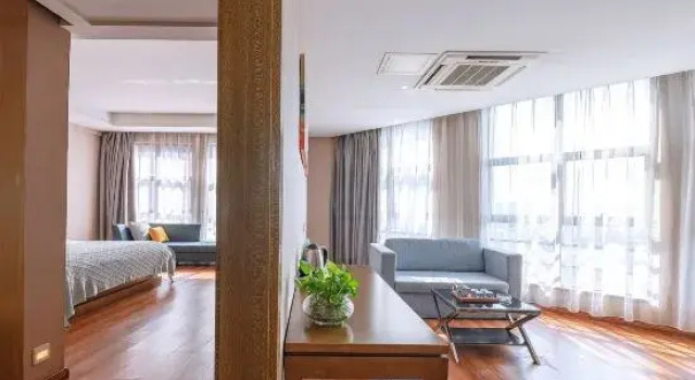 Четырёхместный семейный люкс Liuzhou Meixin Hotel (Liunan Wanda RT-Mart Store)