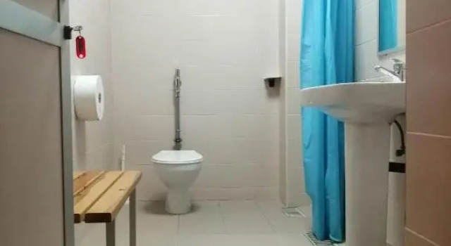 Кровать в общем номере Casa Raspa