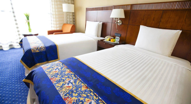 Двухместный номер Deluxe Shanghai Qilu Hotel