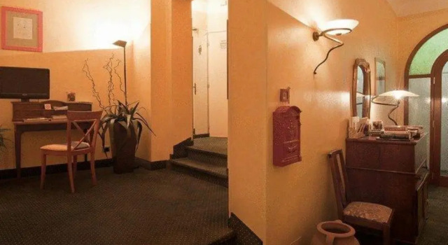 Кровать в общем номере Hotel Centro