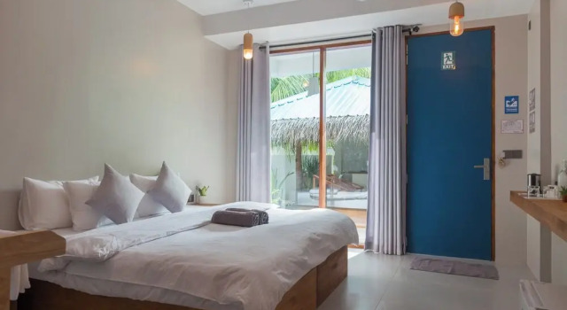 Deluxe Dreier Zimmer mit Gartenblick The Palm Ray