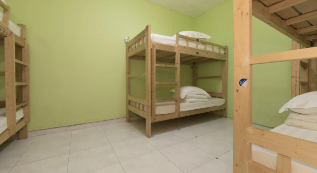Łóżko w pokoju wieloosobowym Traveller@SG Hostel
