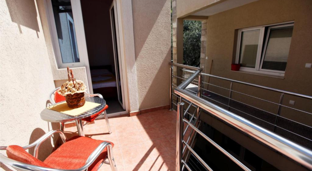 Апартаменты с 2 комнатами с балконом и с видом на море Apartments Baron