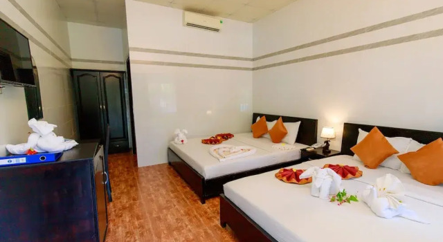 Четырёхместный номер Deluxe с балконом Sun & Sands Beach Hotel