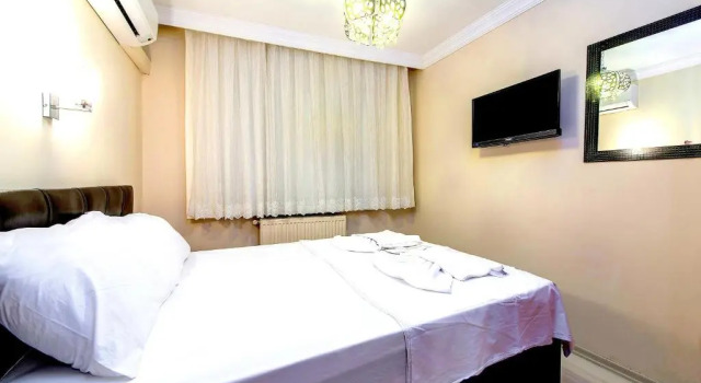 Апартаменты Цокольный этаж с 2 комнатами Efe Apart Hotel