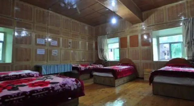 Daocheng Drolma's Guesthouse, Boek Hotel Daocheng Sichuan