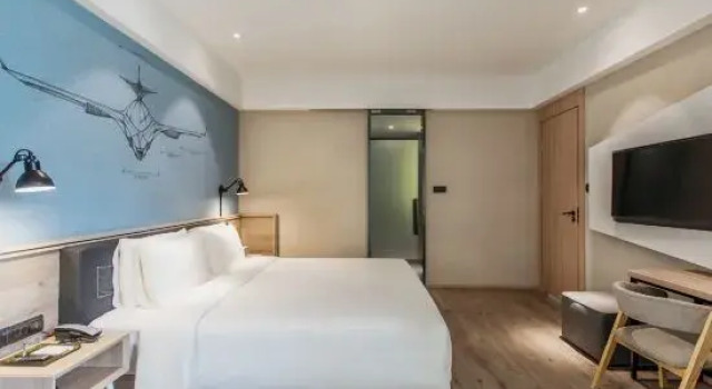 Двухместный семейный люкс Chengdu Manju  Hotel ( West Railway Station Qingyang Wanda Branch)
