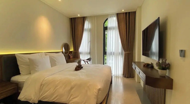 Двухместный люкс Deluxe с балконом и с видом на сад JB Serviced Apartment Phu Quoc