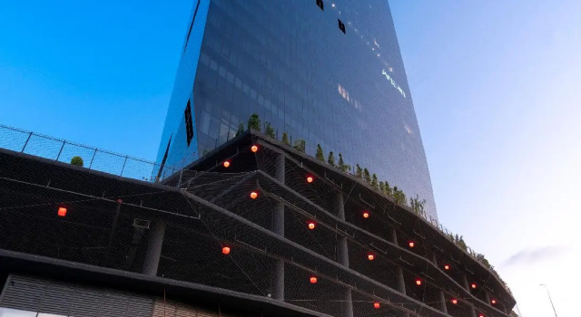 Кровать в общем номере WestSide Residences by Rotana