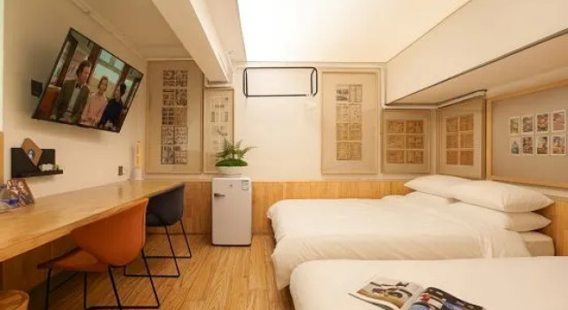 Кровать в общем номере T G Studio Hotel (Guangzhou Jiangnanxi Ergong Subway Station Branch)