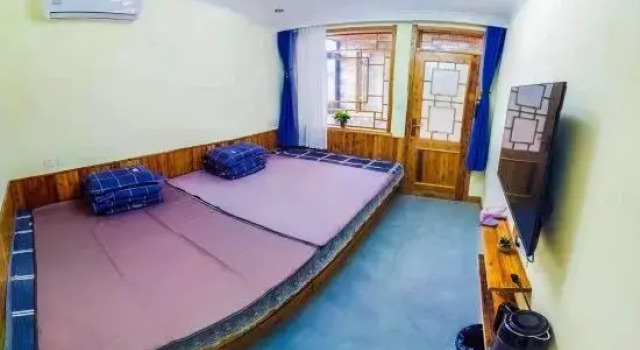 Кровать в общем номере Guanglu Island Yun Yiju Chinese Inn