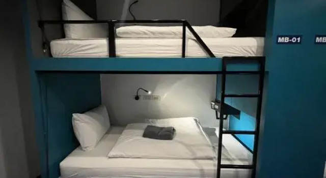 Кровать в общем номере Stardust Boutique Hotel