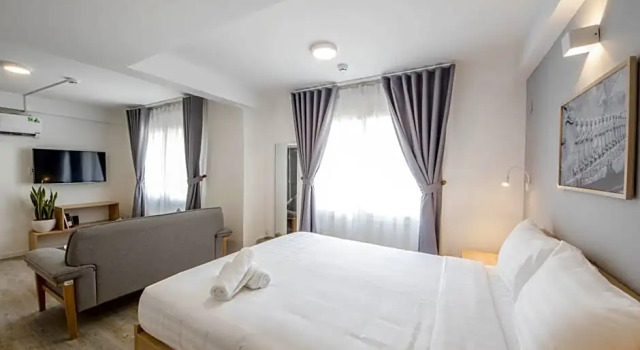 Номер Deluxe Common Inn Thao Dien