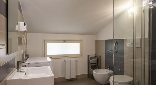 Апартаменты Borgo Aranci - Appartamento in Villa Rosa - 16B