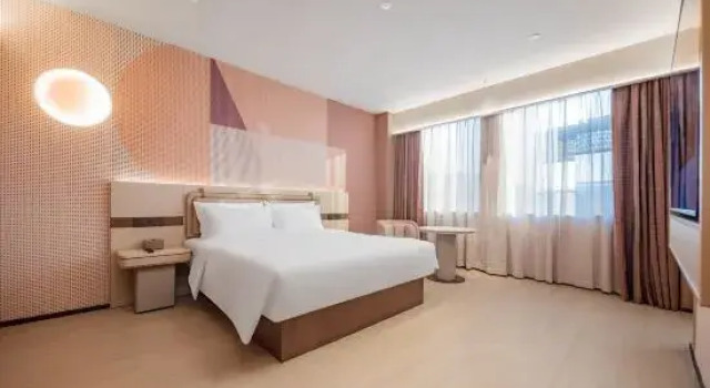 Люкс Deluxe Orange Hotel (Jiaxing Road Food Street Branch, Shihao Plaza, Central District, Leshan City)