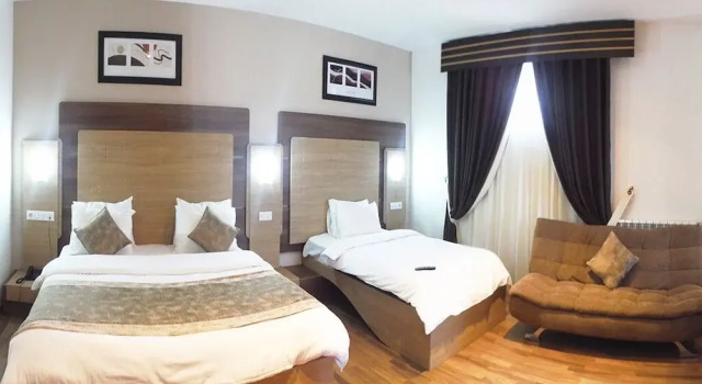 Standard triple famille chambre avec balcon Retaj Moroni Hotel