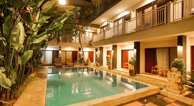 Кровать в общем номере The Kubu Hotel