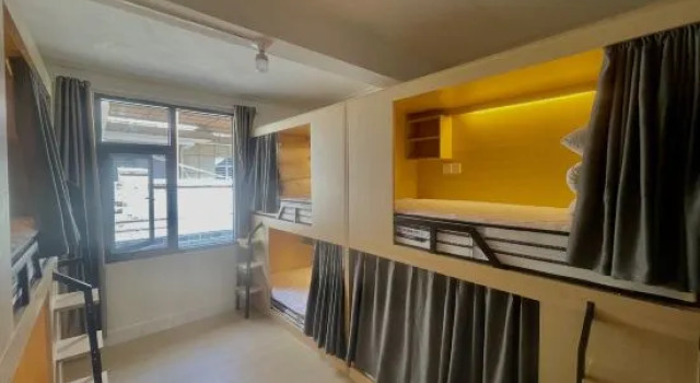 Кровать в общем номере (женский номер) с 6 комнатами Mangshi Lilian Youth Hostel