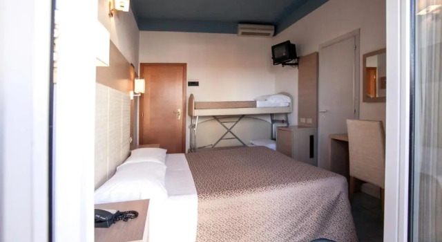 Четырёхместный номер Comfort Hotel Fra I Pini