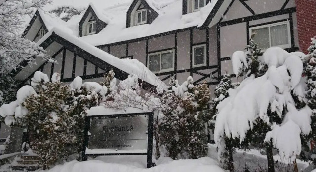 Кровать в общем номере Petit Hotel Enchante