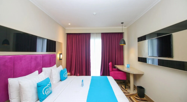 Airy International Plaza Kolonel Atmo 16 Palembang, Rezerwuj Hotel Palembang Sumatra