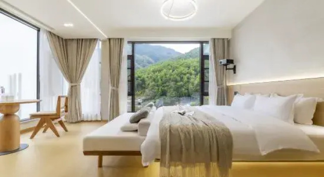 Кровать в общем номере Anji Sunrise Sunset Homestay (Yunshang Grassland Alpine Tourism Resort)