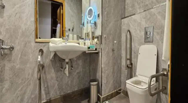 Кровать в общем номере Jiwar Al Saha Hotel