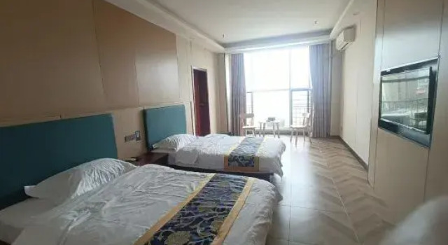 Четырёхместный люкс Zhongya Zhimen Business Hotel