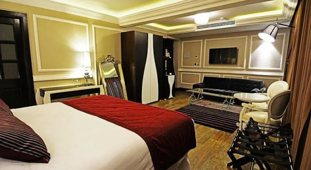 Кровать в общем номере Hotel Sommelier Boutique