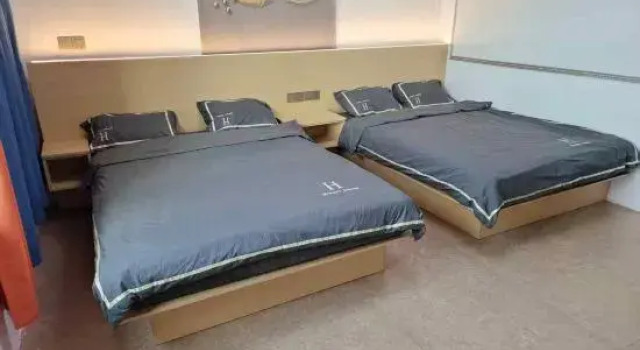 Кровать в общем номере Yuanheng Homestay