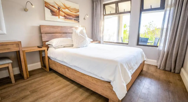 Modern self-catering apartment in a secure estate, Забронировать Апартаменты/квартира Апартаменты Плеттенберг-Бей, рядом с Plettenberg Bay Golf Course, Апартаменты/квартира