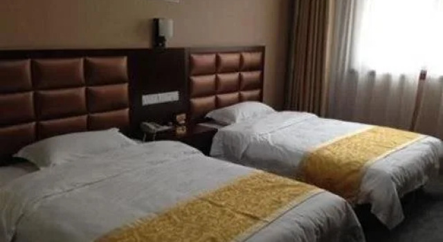 Xingyang Guoren Holiday Hotel, Book Hotel Xingyang Henan