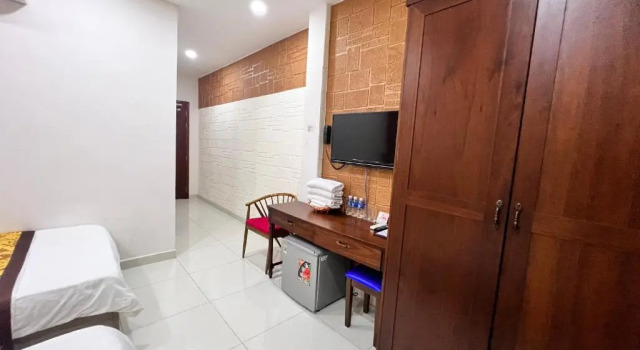 Семейный номер Deluxe SAZI AMILA Nguyen Hue HOTEL