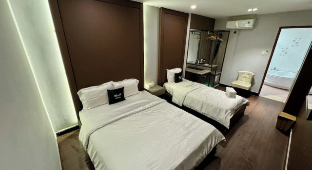 Трёхместный номер Executive M&H Hotel