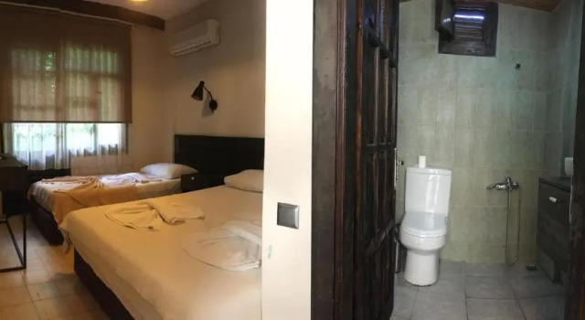 Трёхместный номер Standard с балконом Derin Luxury Hotel