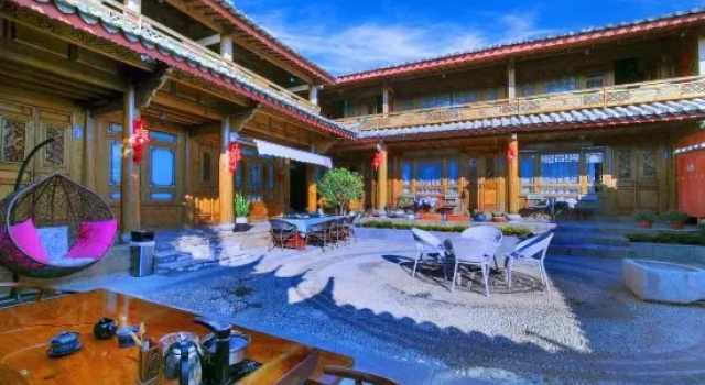 Huayang Nianhua Homestay, Забронировать Отель Лицзян Юньнань, рядом с Water Wheels