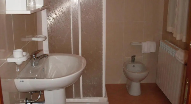 Четырёхместный номер Standard Albergo Quattro Pini