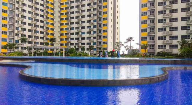 New Furnsihed Studio Room Apartment at Springlake Bekasi By Travelio
