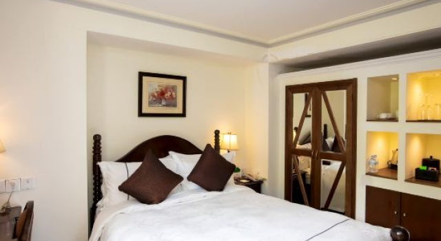 Кровать в общем номере Haier Country Villa