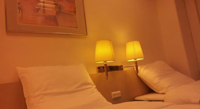 Кровать в общем номере Hotel New Fair Munich Messe