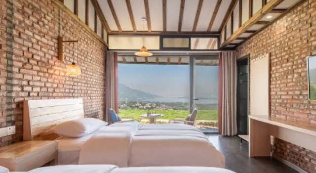 Кровать в общем номере Xichang Banyin Yunju Homestay