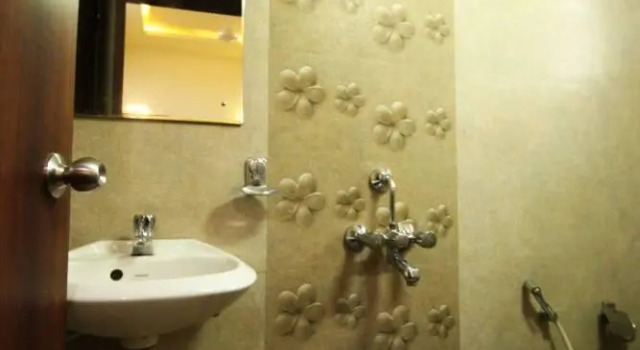 Кровать в общем номере Hotel Vijay