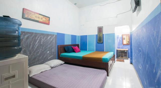 Кровать в общем номере Penginapan Pugeran - Hostel