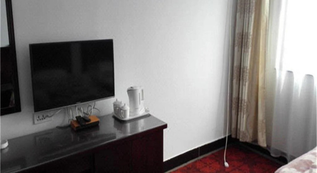 Xinyi Hotel, Забронировать Отель Синьчжоу Шаньси