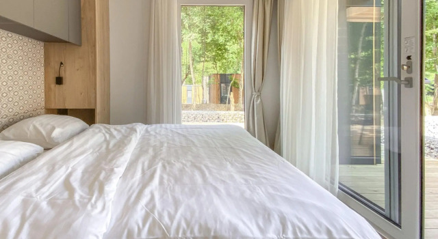Modern chalet with air conditioning, in a holiday park, in a natural environment, Foglalás Faház / Chalet Übereisenbach 