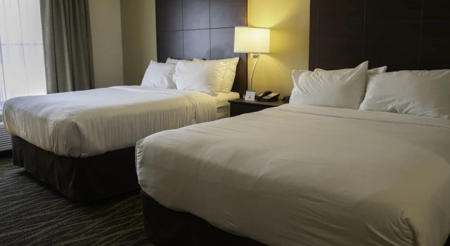 Standard Vierer Zimmer Cobblestone Hotel & Suites - Two Rivers
