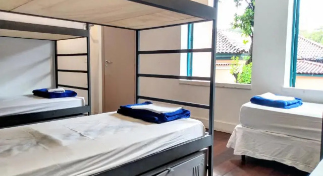 Кровать в общем номере Hospedaria Rio