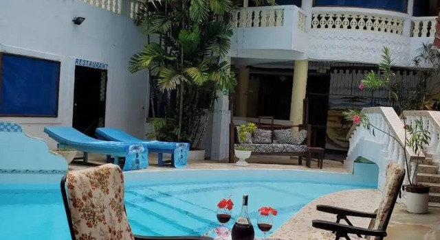 A Sentimental Villa With a Swimmingpool Near Beach, Book Villa Hotels in Coast Region with Parking, Parking
